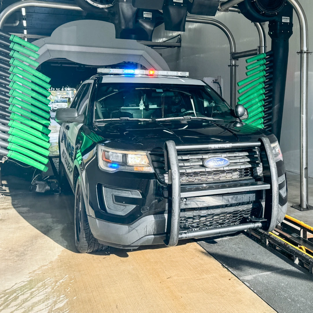 Police SUV entering the wash tunnel