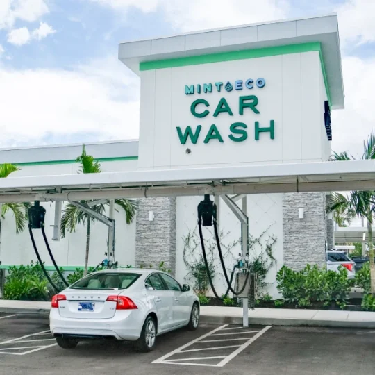 Mint Eco Car Wash exterior with vacuum stations at the Okeechobee Turnpike East location