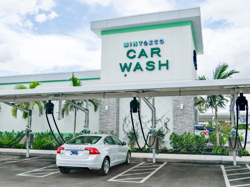 Mint Eco Car Wash exterior with vacuum stations at the Okeechobee Turnpike East location